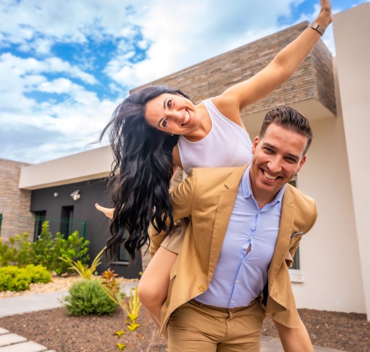 Couple celebrates buying home